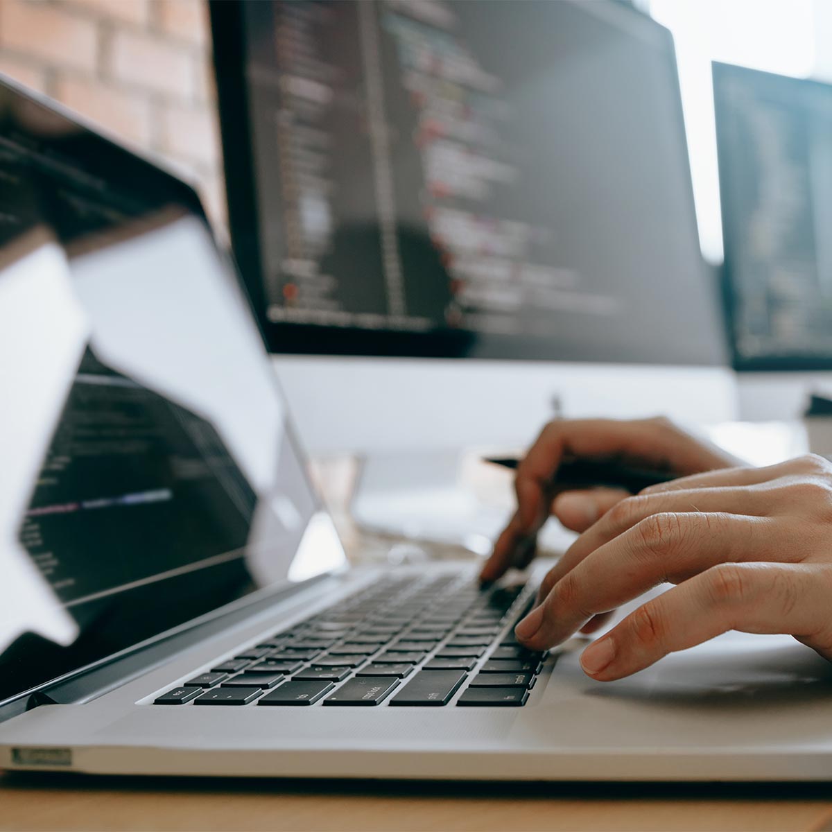 Image of web developer working on a legal website to boost search engine rankings from other search engines